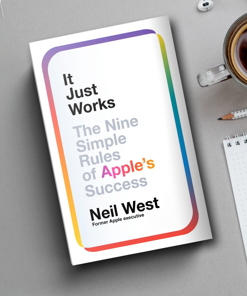 It Just Works by Neil West on a desk with a coffee and notebook
