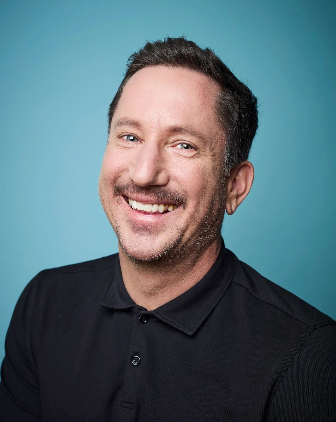 Neil West smiling